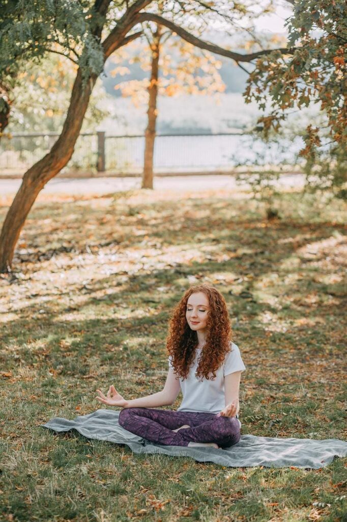 A woman meditating in nature